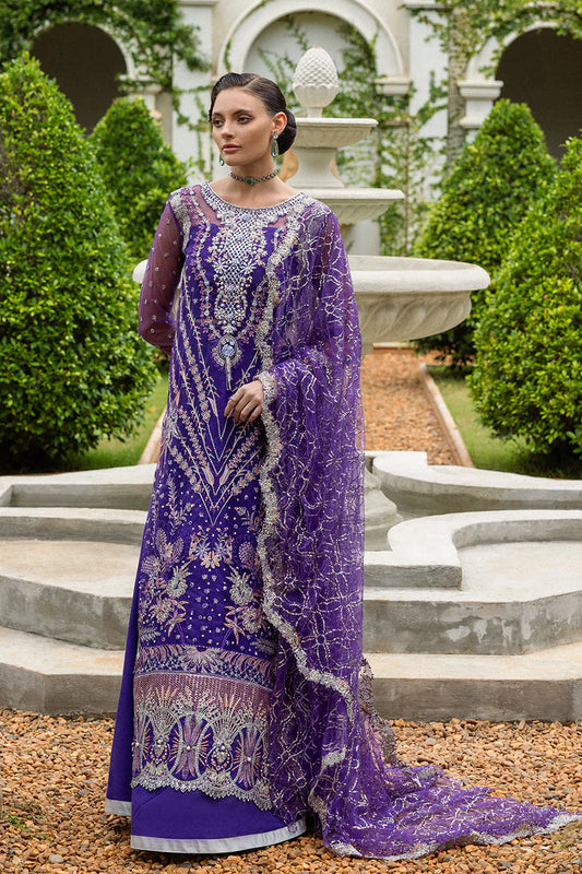 Model wearing deep purple embroidered dress from Mushq Untamed Heart, Pakistani luxury pret for weddings, shop Pakistani clothes online in UK
