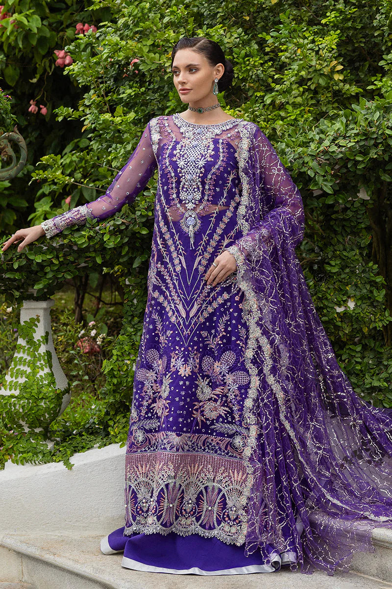 Model wearing deep purple embroidered dress from Mushq Untamed Heart, Pakistani luxury pret for weddings, shop Pakistani clothes online in UK
