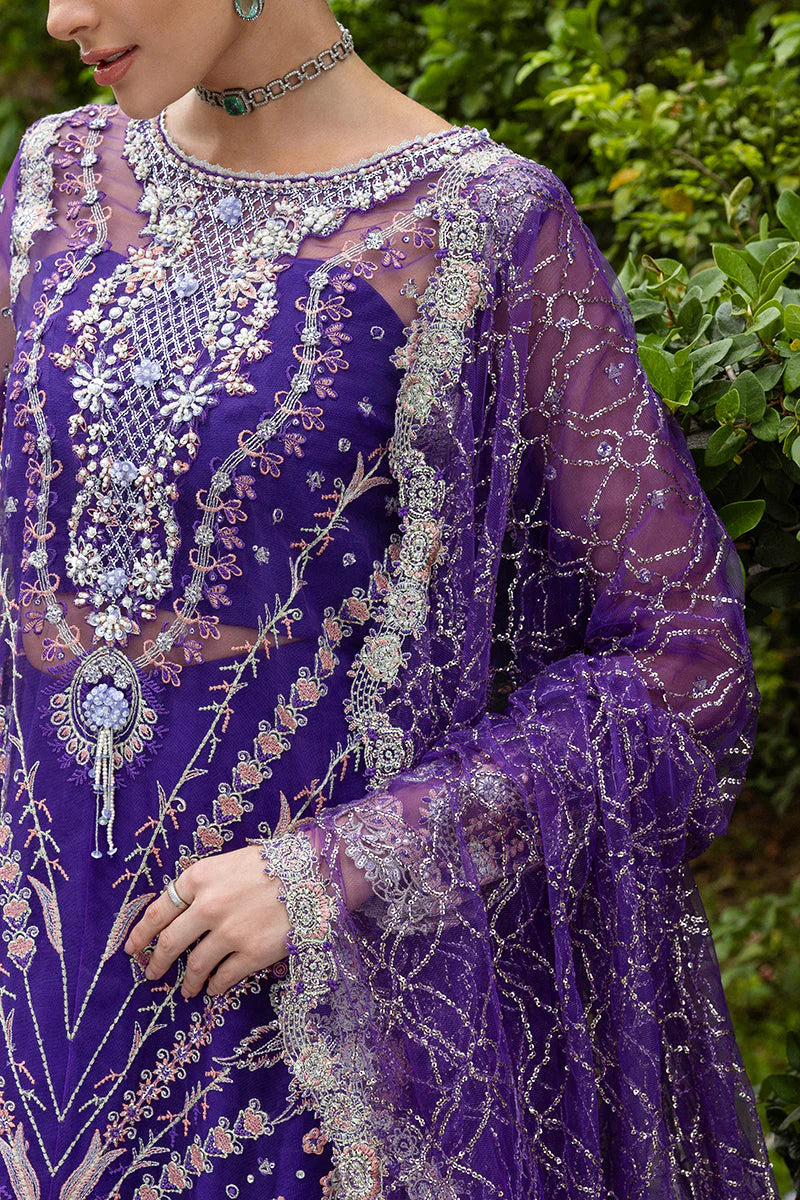 Model wearing deep purple embroidered dress from Mushq Untamed Heart, Pakistani luxury pret for weddings, shop Pakistani clothes online in UK
