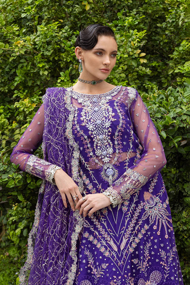 Model wearing deep purple embroidered dress from Mushq Untamed Heart, Pakistani luxury pret for weddings, shop Pakistani clothes online in UK
