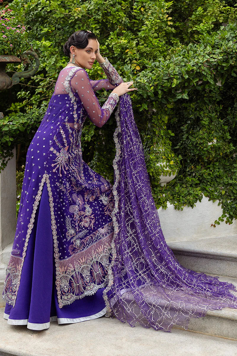 Model wearing deep purple embroidered dress from Mushq Untamed Heart, Pakistani luxury pret for weddings, shop Pakistani clothes online in UK
