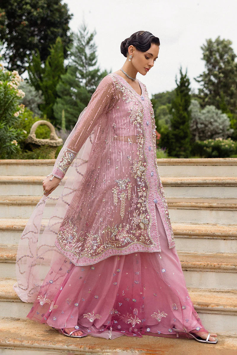 Model wearing pastel pink embellished dress from Mushq Pretty in Pink, Pakistani luxury pret ideal for weddings, shop online in UK
