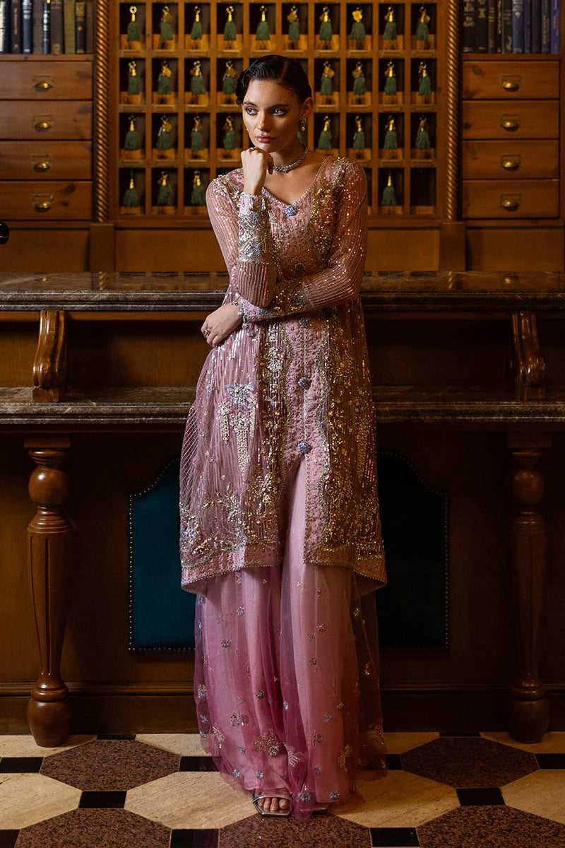 Model wearing pastel pink embellished dress from Mushq Pretty in Pink, Pakistani luxury pret ideal for weddings, shop online in UK
