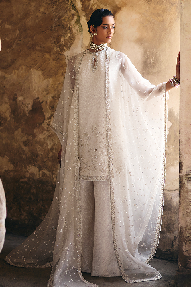 Model wearing ELUNA, front view, a Pakistani designer outfit by Suffuse, available online in the UK.