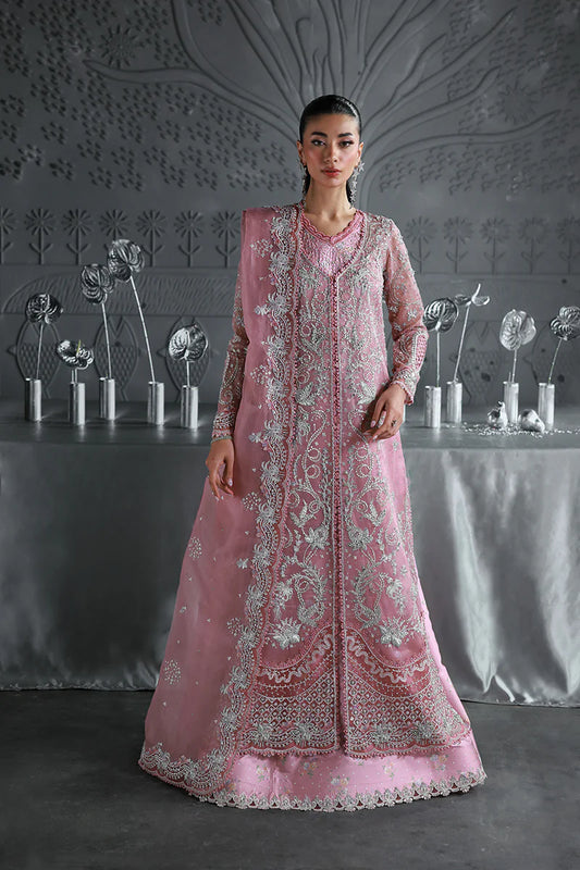 Model wearing MF-07 Rosalyn by Qalamkar in rose pink hand-embroidered dress – Pakistani luxury pret perfect for festive wear, shop online in UK.