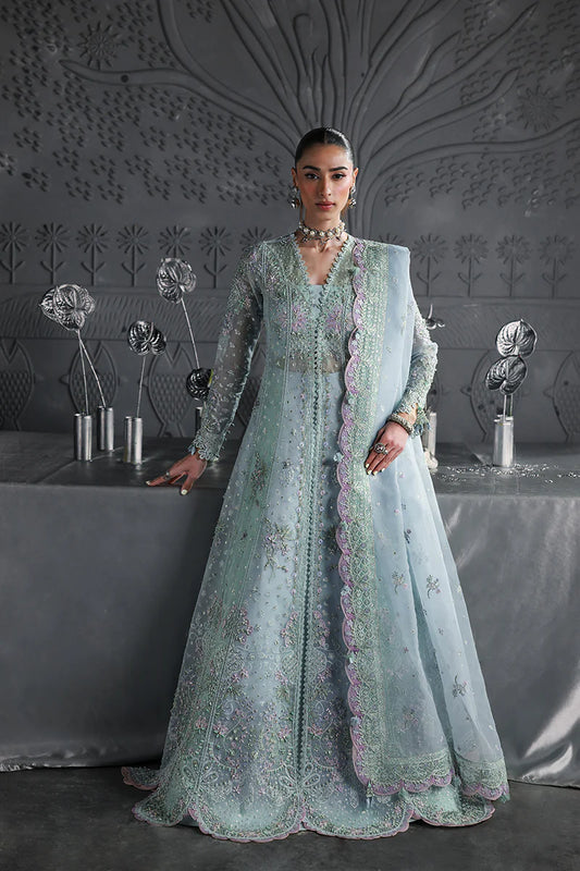 Model wearing MF-08 Serene Aqua by Qalamkar in aqua blue hand-embroidered dress – Pakistani luxury pret perfect for festive wear, shop online in UK.
