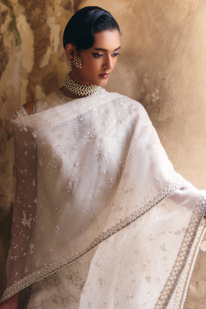 Model wearing ELUNA, close-up detail, a Pakistani designer outfit by Suffuse, available online in the UK.