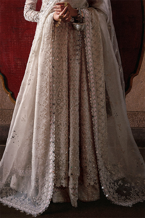 Model wearing ivory embellished gown from Suffuse Zahrell, Pakistani luxury pret, shop elegant Pakistani clothes online in UK
