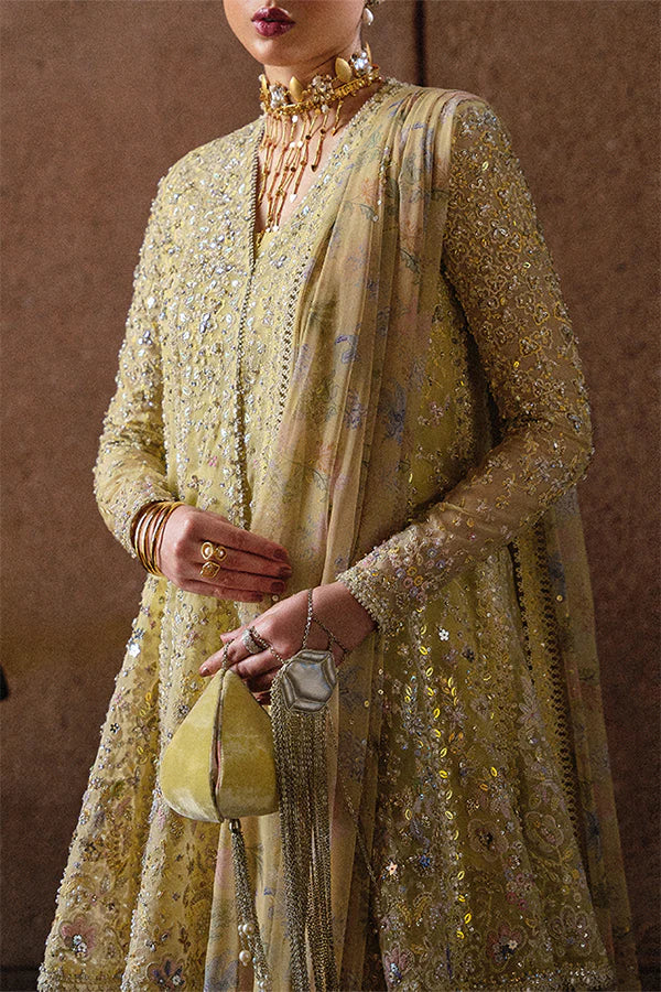Model wearing pastel yellow embellished ensemble from Suffuse Merivah, Pakistani luxury pret, shop Pakistani clothes online in UK

