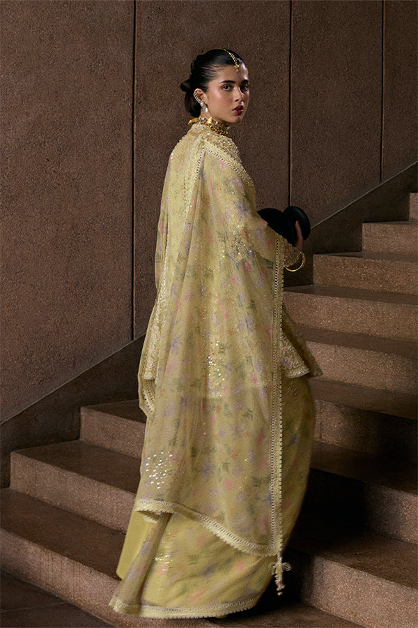 Model wearing pastel yellow embellished ensemble from Suffuse Merivah, Pakistani luxury pret, shop Pakistani clothes online in UK
