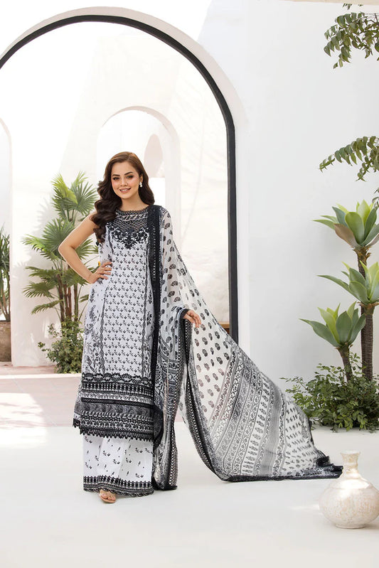 Model wearing Sobia Nazir Vital 2025 Design 10A in black and white with intricate prints. Shop Pakistani luxury pret and Pakistani clothes online in UK.
