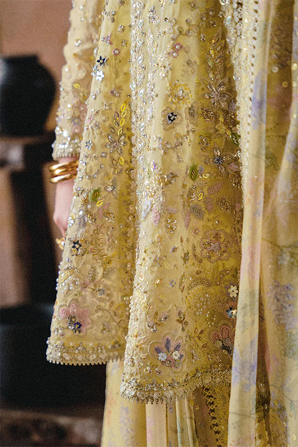 Model wearing pastel yellow embellished ensemble from Suffuse Merivah, Pakistani luxury pret, shop Pakistani clothes online in UK
