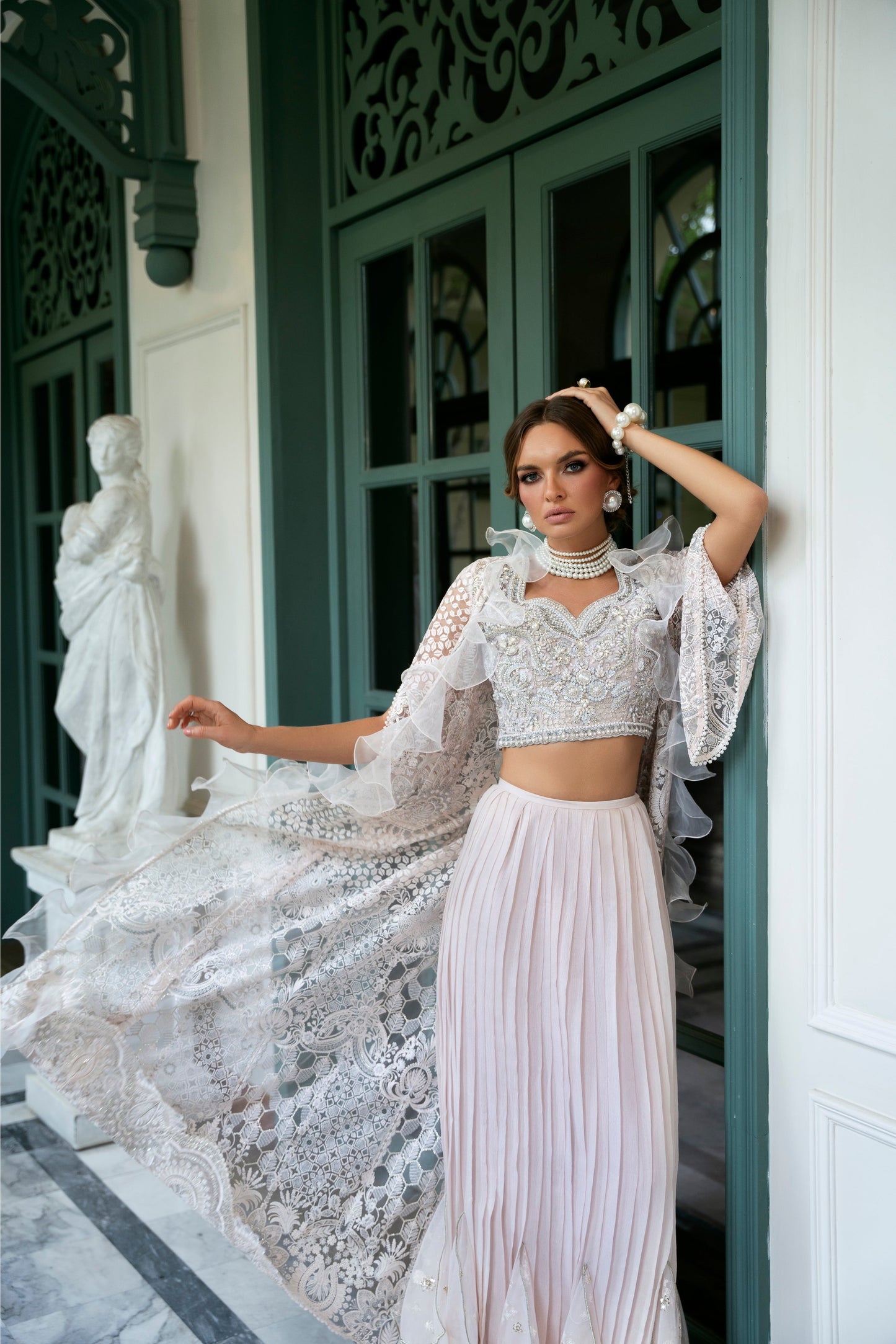 Model wearing Belisa dress from Mysie by Tahira in soft pink with intricate embellishments, perfect for Pakistani luxury pret in the UK.