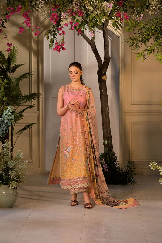 Model wearing peach and yellow embroidered dress from Sobia Nazir Vital 2025 Design 11B. Pakistani luxury pret clothes online in UK.
