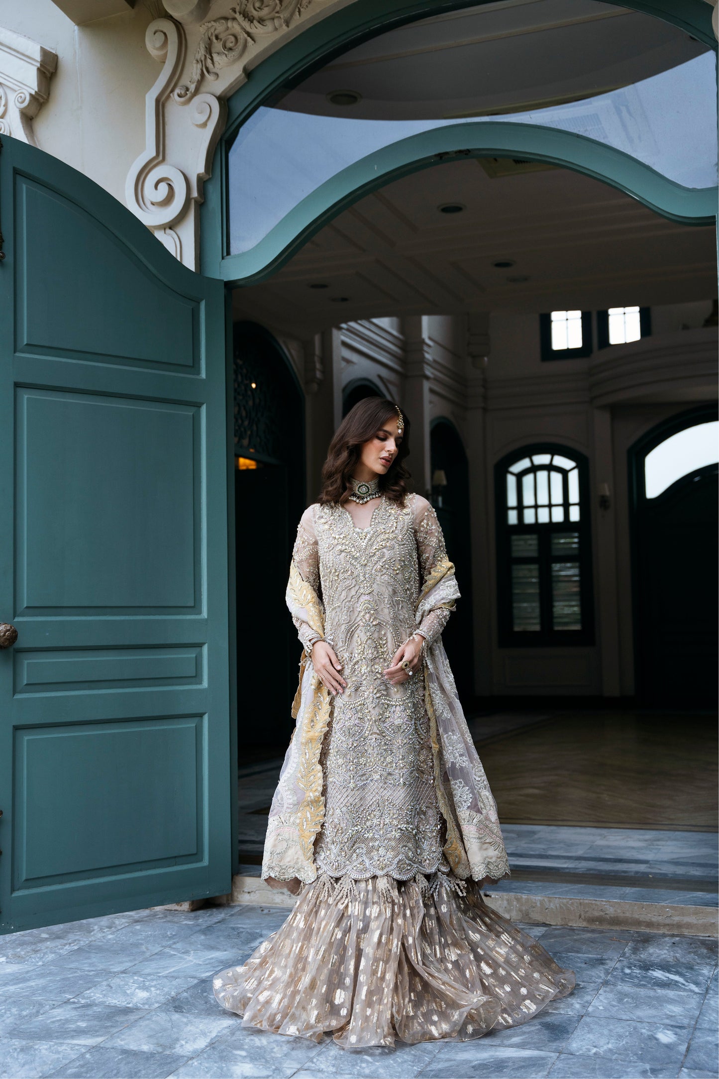 Model wearing PEONY from Mysie by Tahira, a soft beige and gold embellished ensemble, perfect for Pakistani luxury pret in the UK.