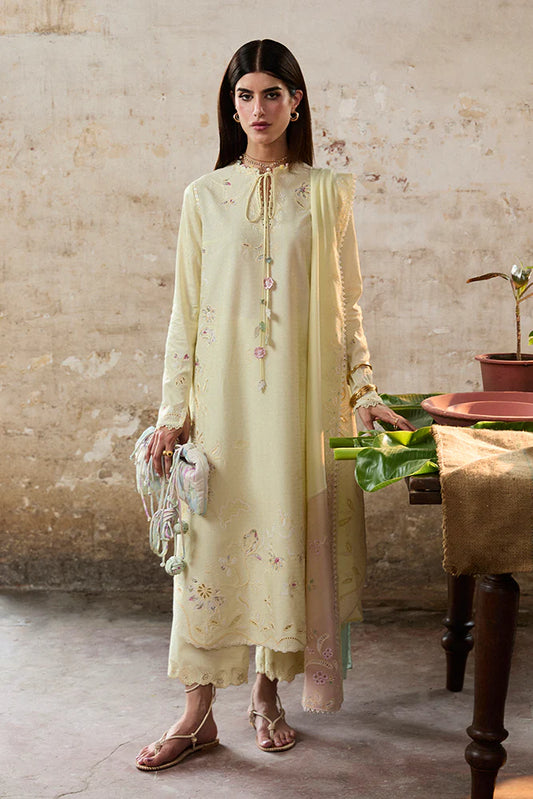 Model wearing Amaah by Suffuse in pastel yellow with delicate embroidery – elegant Pakistani luxury pret outfit in UK.