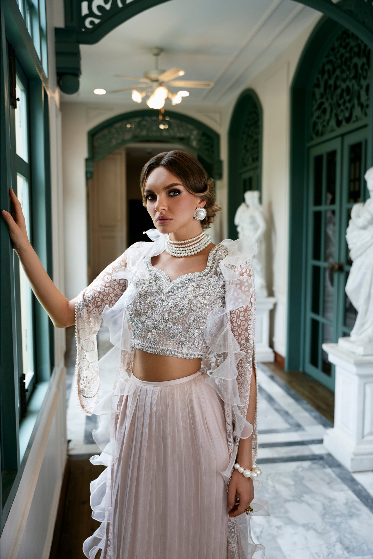 Model wearing Belisa dress from Mysie by Tahira in soft pink with intricate embellishments, perfect for Pakistani luxury pret in the UK.