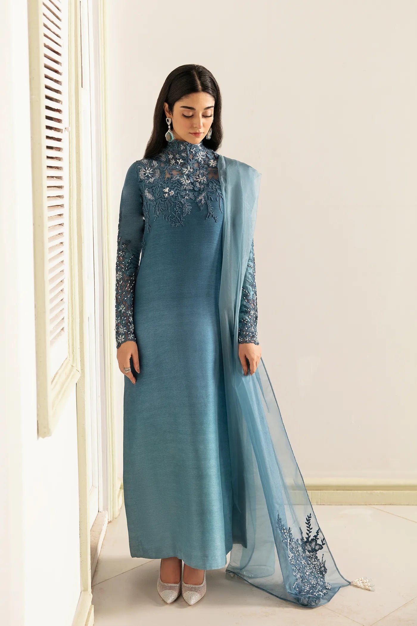 Model wearing VIVA LA VIDA's AQUA ROMANCE, an equisite mold by Musferah Saad UK, Pakistani Clothes UK.