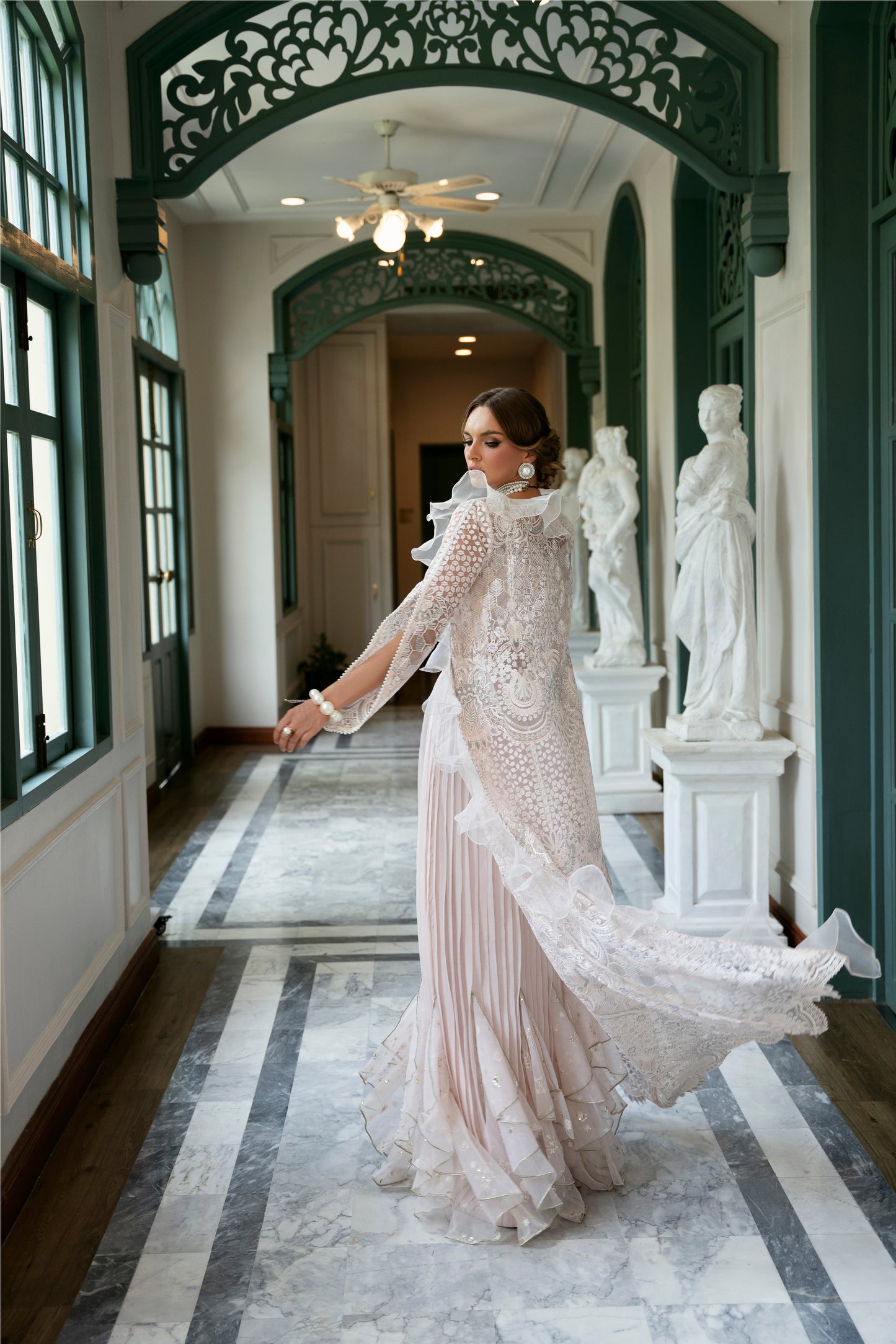Model wearing Belisa dress from Mysie by Tahira in soft pink with intricate embellishments, perfect for Pakistani luxury pret in the UK.