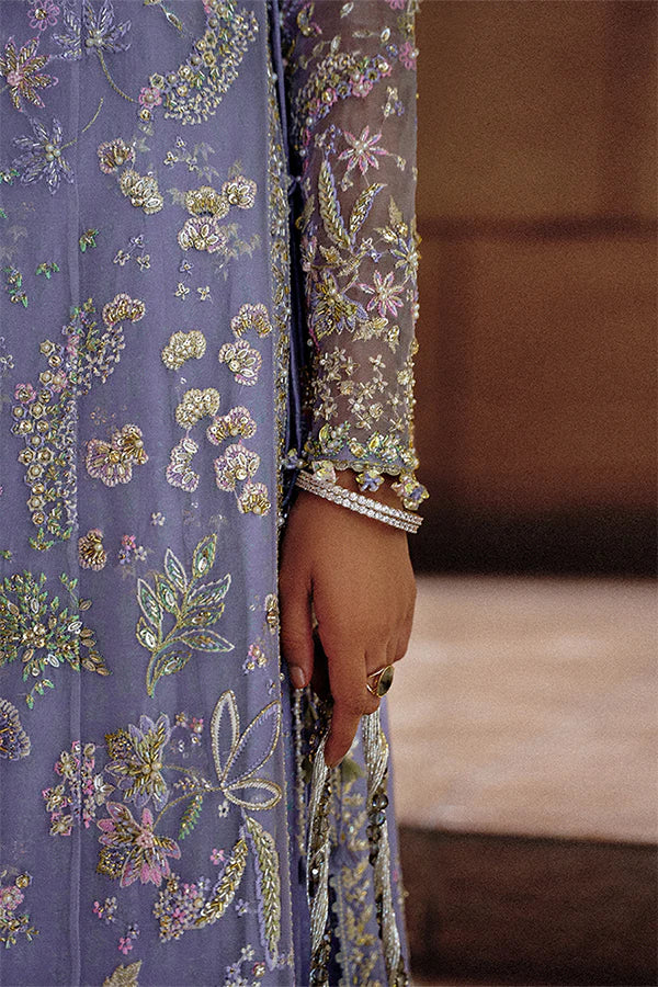 Model wearing pastel mint blue embellished ensemble from Suffuse Calira, Pakistani luxury pret, shop Pakistani clothes online in UK
