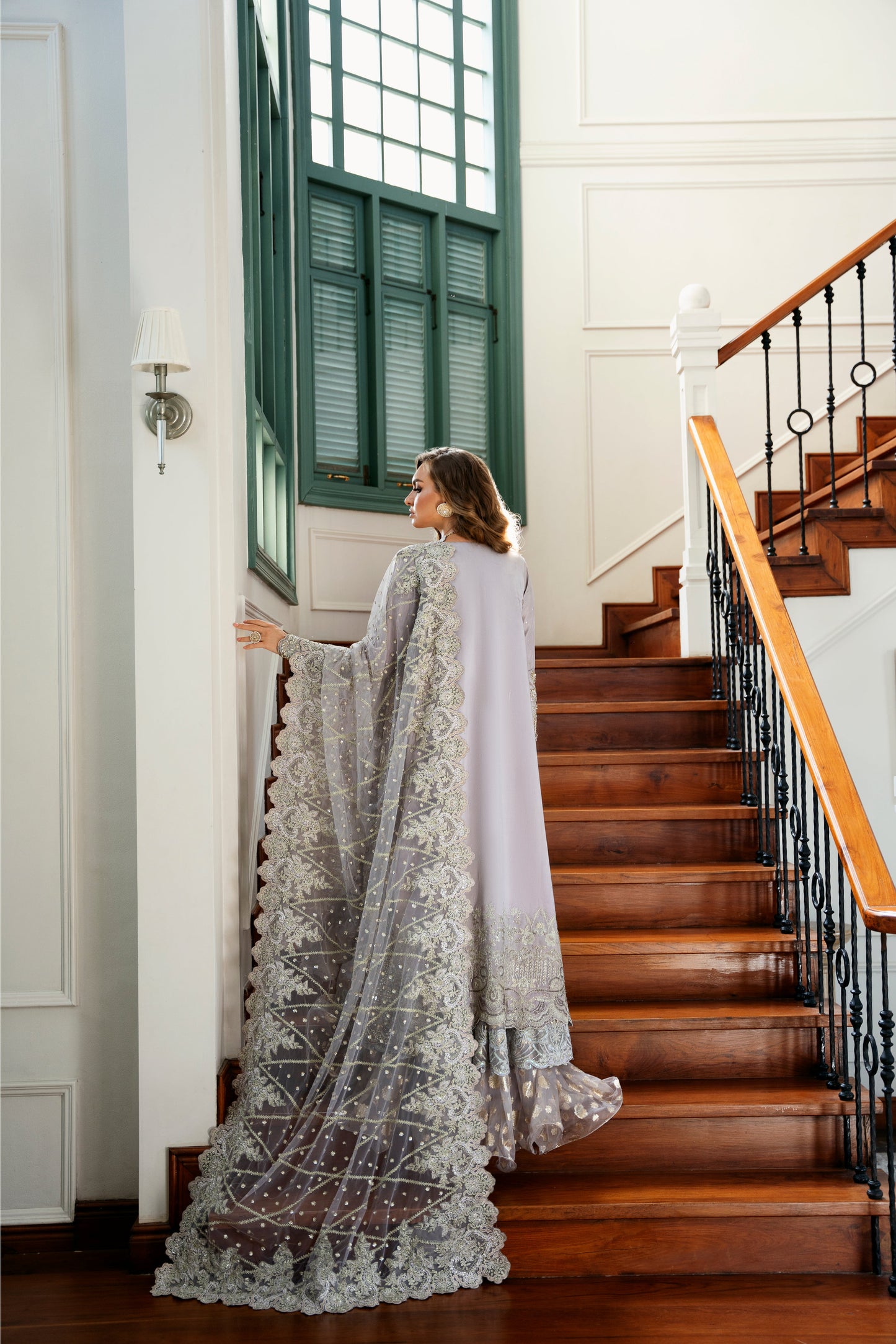 Model wearing Lotus from Mysie by Tahira, a luxurious grey embellished lehenga choli perfect for Pakistani luxury pret in the UK.