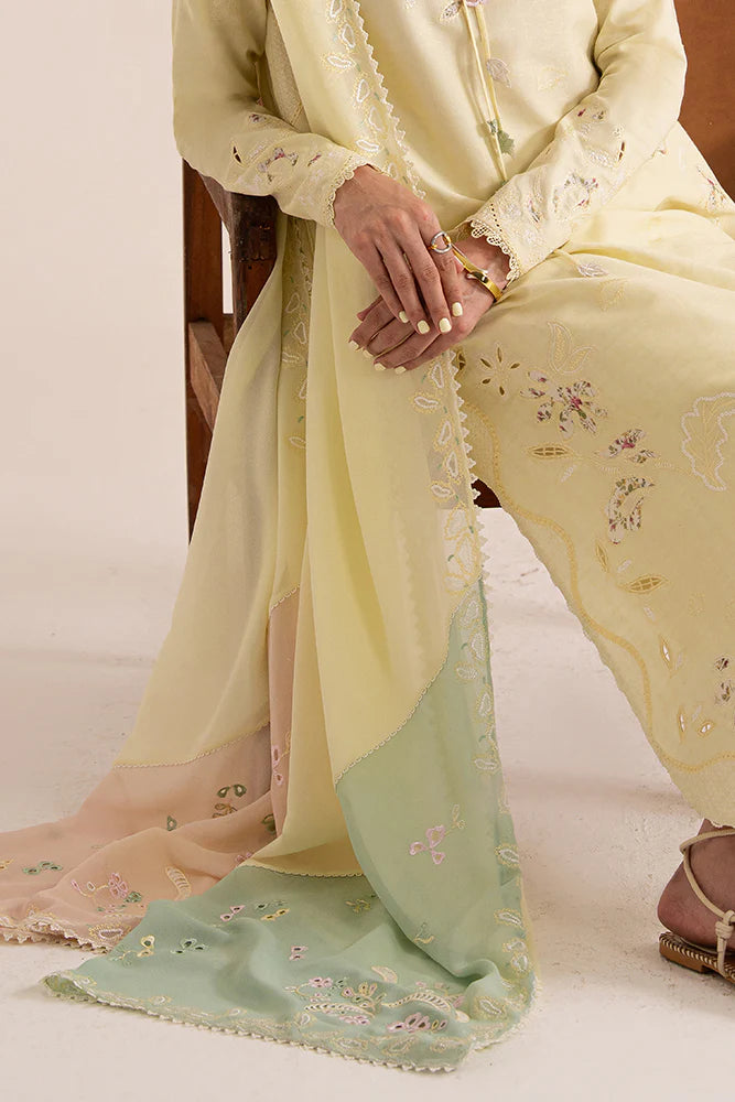 Model wearing Amaah by Suffuse in pastel yellow with delicate embroidery – elegant Pakistani luxury pret outfit in UK.