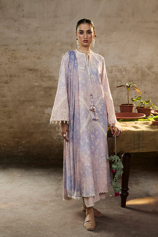 Model wearing Eeshar by Suffuse in pastel lilac and blue with delicate embroidery – elegant Pakistani luxury pret outfit in UK.
