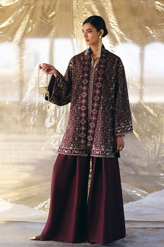 Model wearing ORANA, front view, a Pakistani designer outfit by Suffuse, available online in the UK.