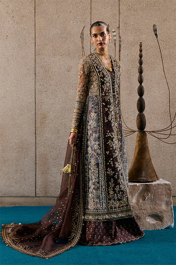 Model wearing dark brown embellished ensemble from Suffuse Vionna, Pakistani luxury pret, shop Pakistani clothes online in UK