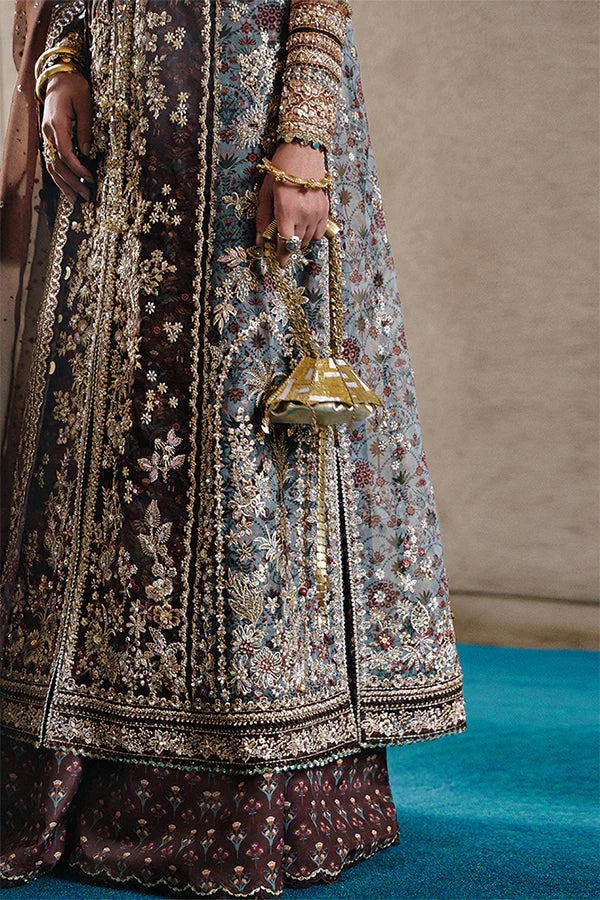 Model wearing dark brown embellished ensemble from Suffuse Vionna, Pakistani luxury pret, shop Pakistani clothes online in UK