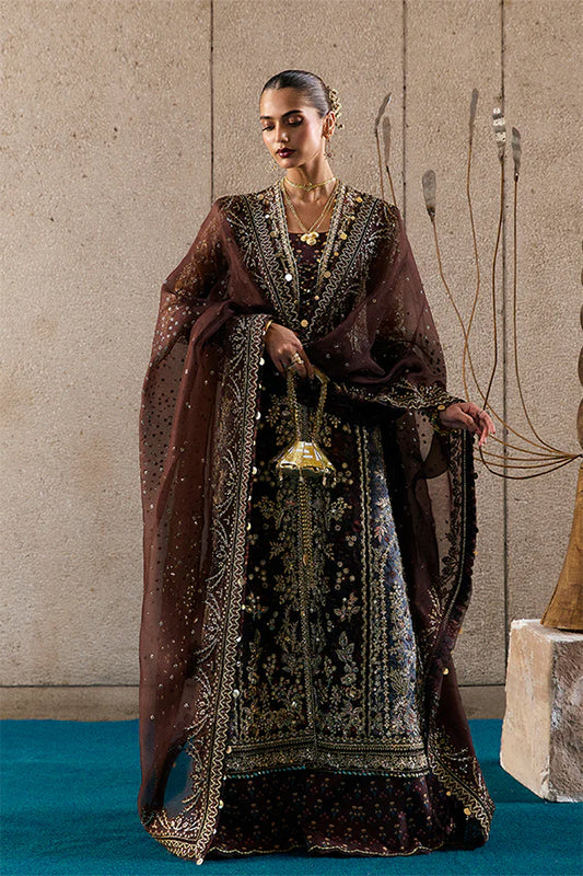 Model wearing dark brown embellished ensemble from Suffuse Vionna, Pakistani luxury pret, shop Pakistani clothes online in UK