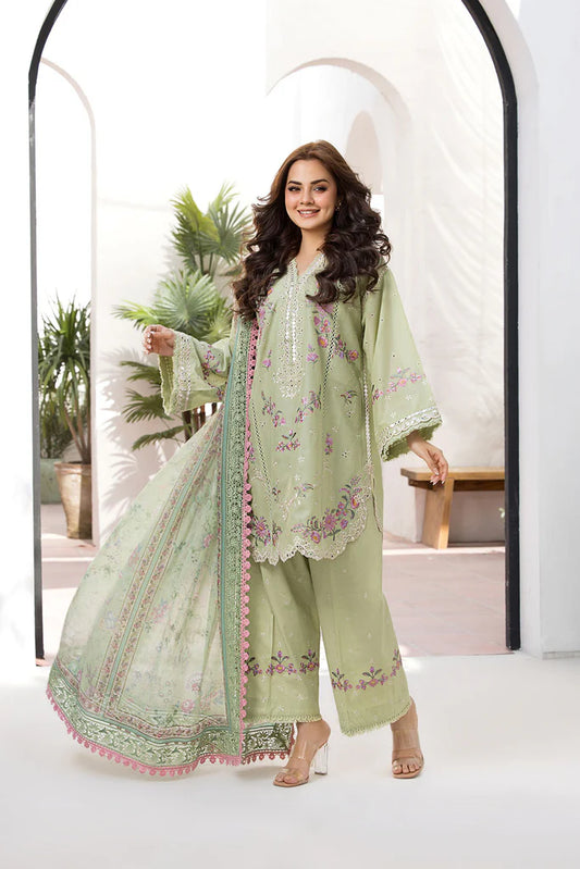 Model wearing Sobia Nazir Vital 2025 Design 1A in pastel green with floral embroidery. Shop Pakistani luxury pret clothes online in UK.