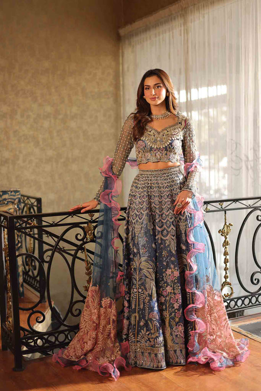 Model wearing blue and pink embellished lehenga choli Stella from Mysie By Tahira Wedding Edits '25, Pakistani luxury pret online in UK.