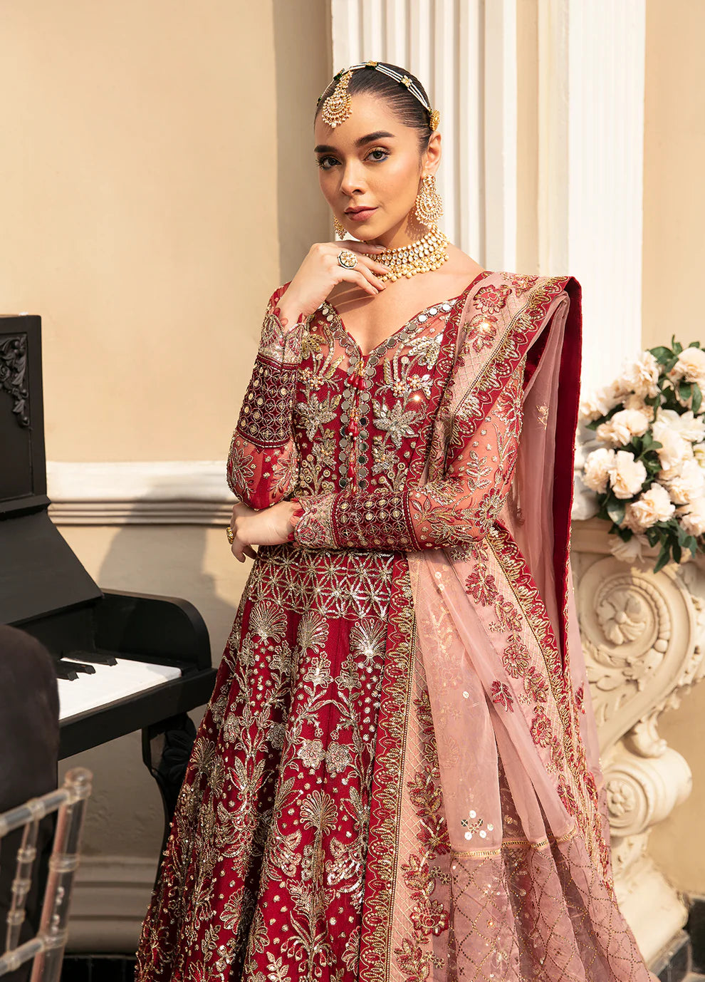 Model wearing Gulaal Unstitched Wedding Collection ZIVA GL-WU-23V1-02 lehnga choli in red hues, showcasing Pakistani clothes online in UK.