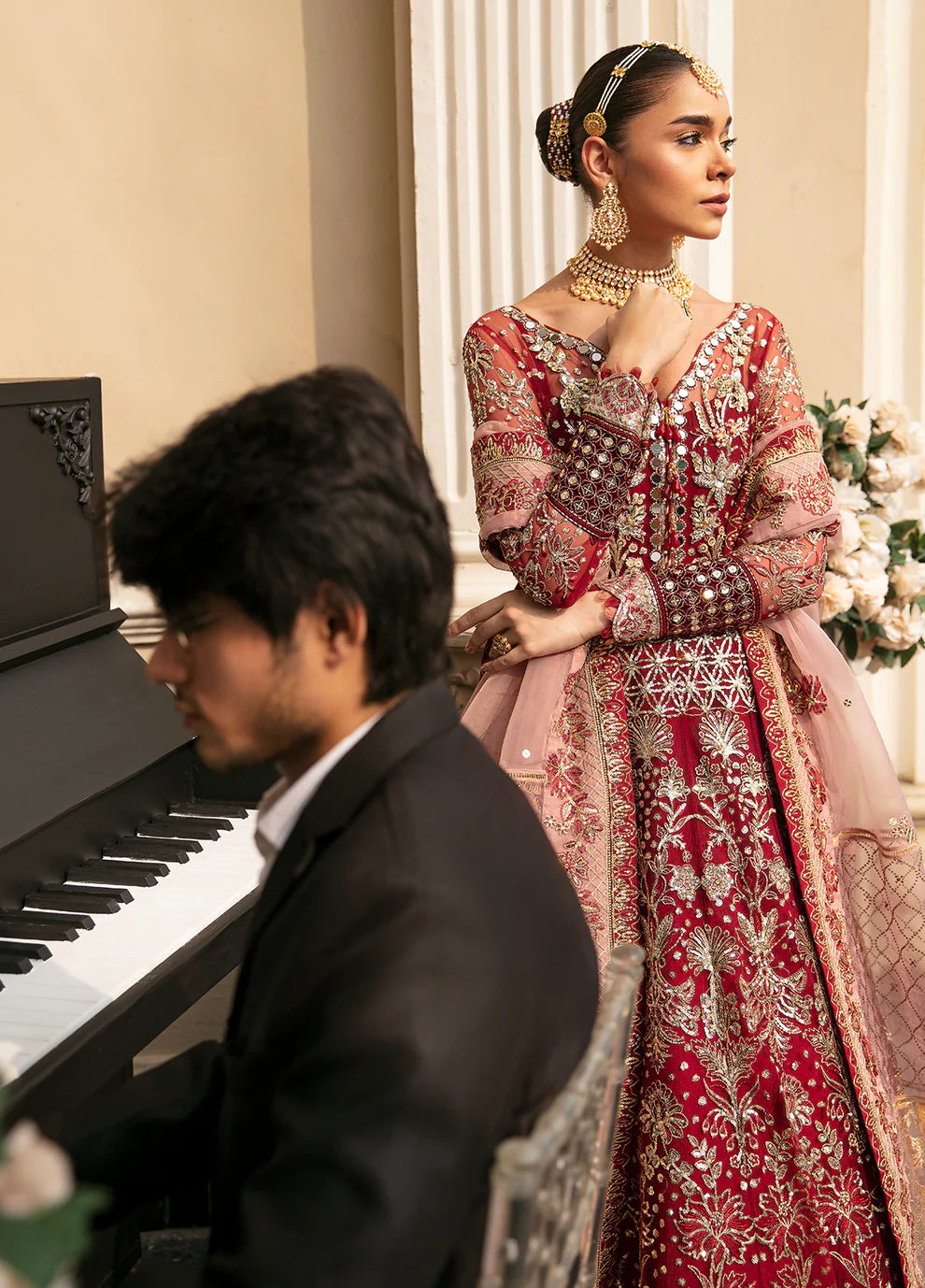 Model wearing Gulaal Unstitched Wedding Collection ZIVA GL-WU-23V1-02 lehnga choli in red hues, showcasing Pakistani clothes online in UK.