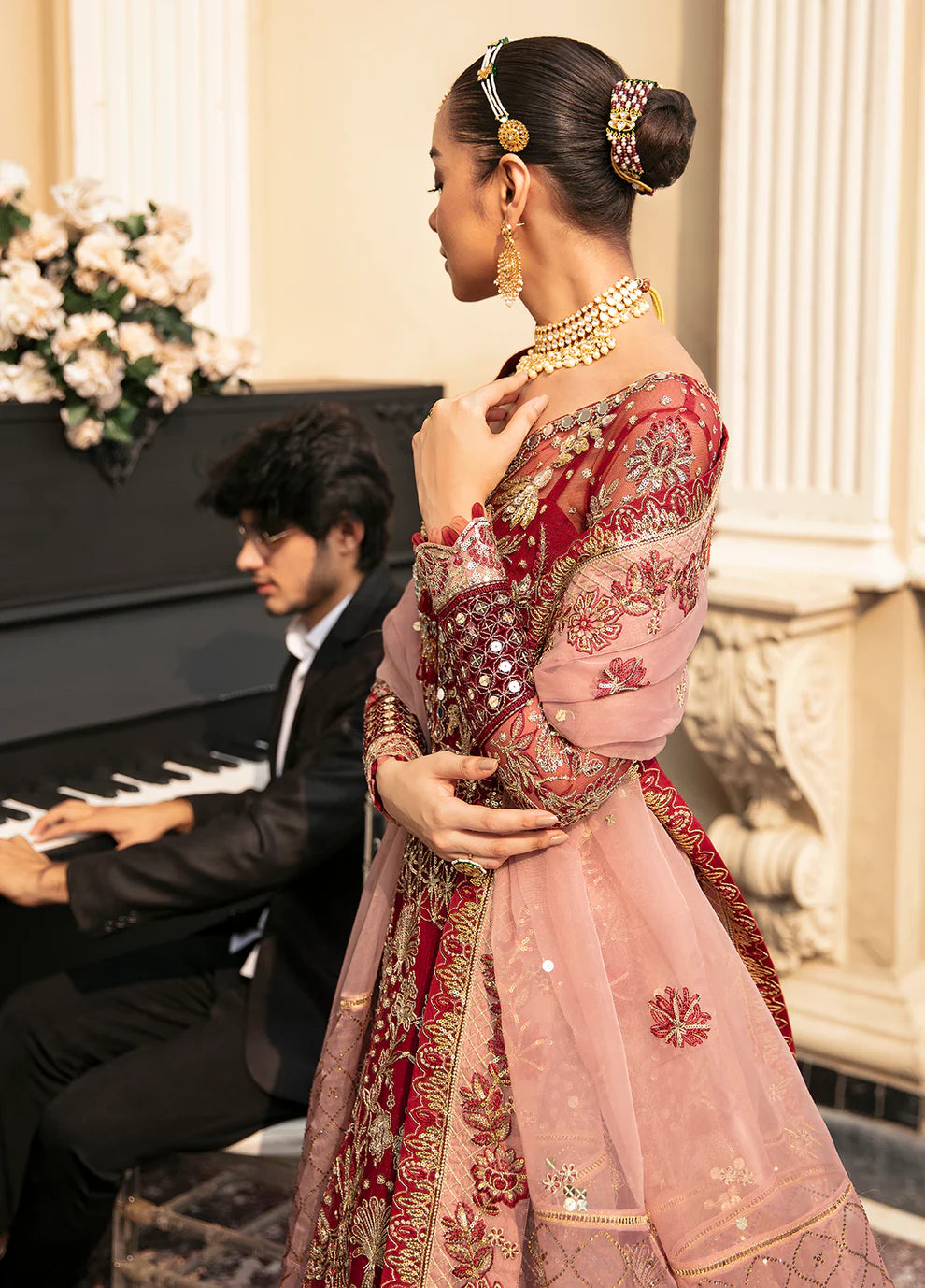 Model wearing Gulaal Unstitched Wedding Collection ZIVA GL-WU-23V1-02 lehnga choli in red hues, showcasing Pakistani clothes online in UK.