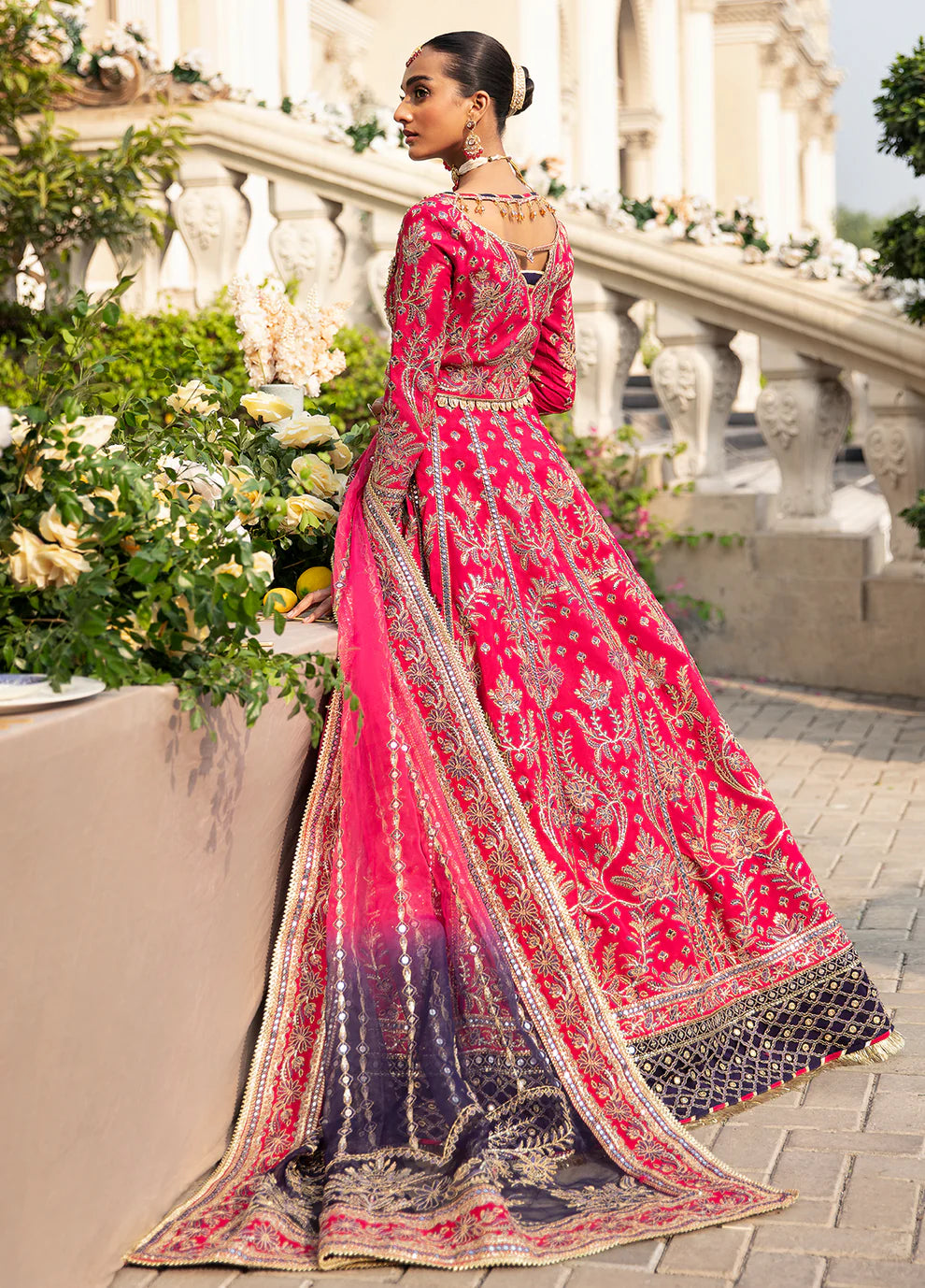 Model in vibrant NUHA dress by Gulaal UK, Pakistani wedding collection '23.