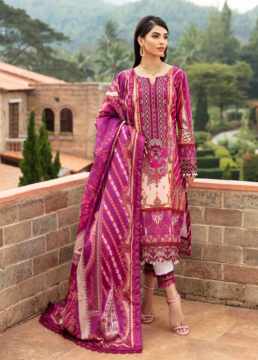 Model in Gulaal's ALAARA pink ensemble, ornate design