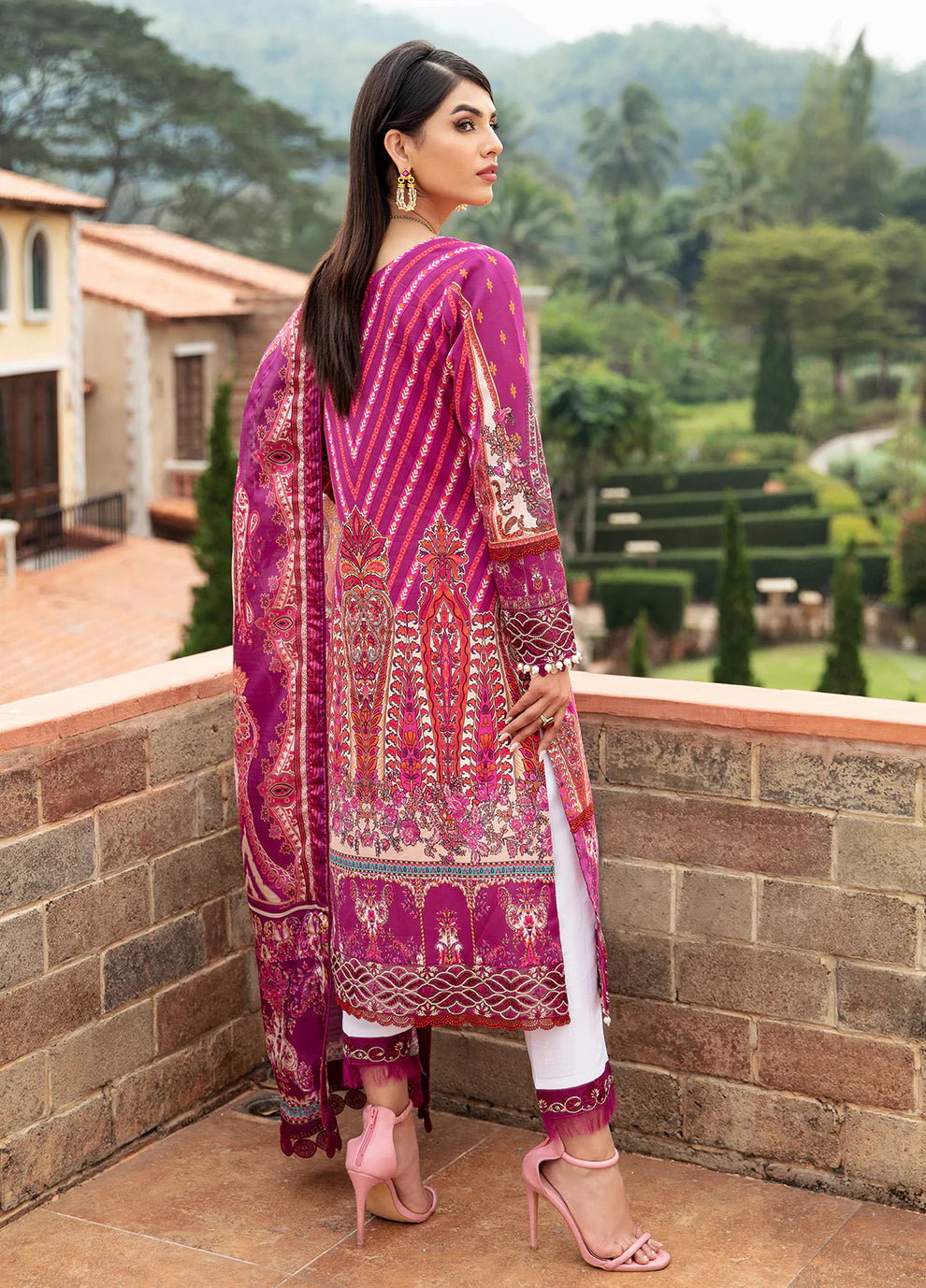 Model in Gulaal's ALAARA pink ensemble, ornate design