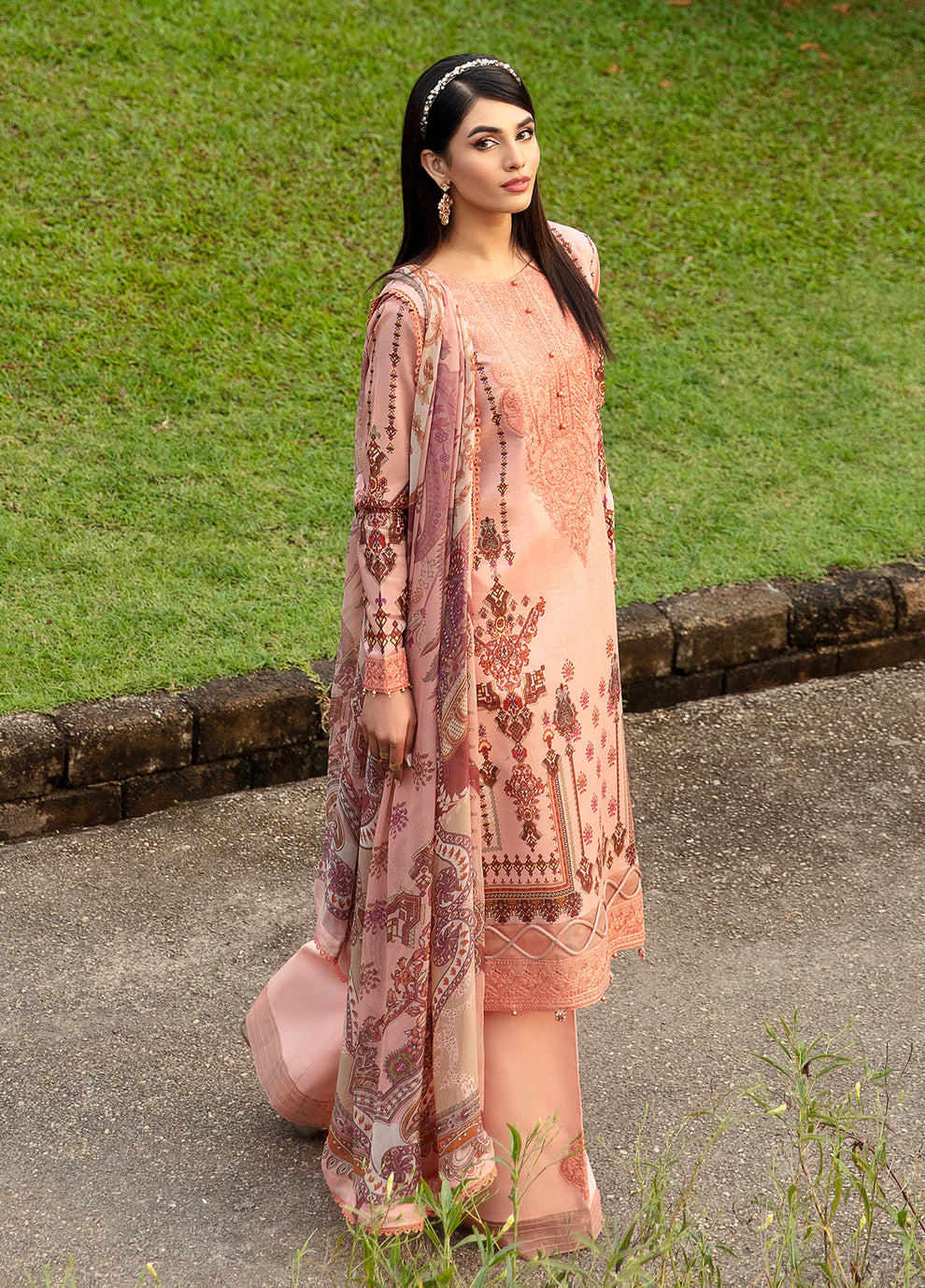 Model wearing elegant peach HESTIA GL-L-24V1-12 dress from Gulaal's Spring Ballet 2024 collection, showcasing Pakistani clothes online in the UK.