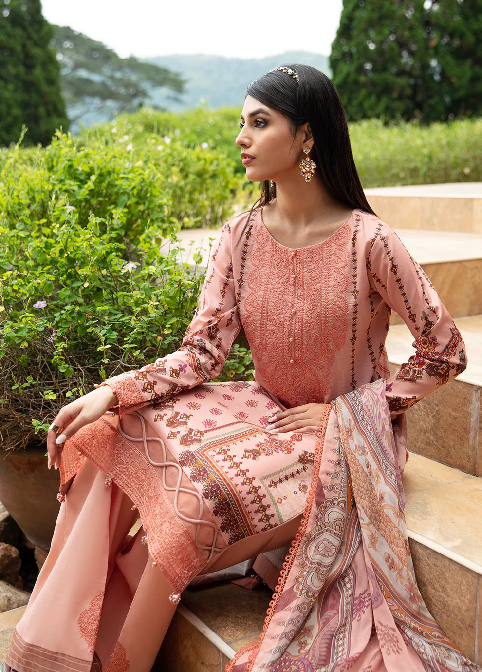 Model in Gulaal's HESTIA peach outfit, elegant embroidery