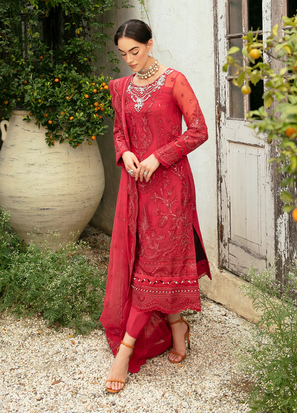 Model in Gulaal Ulmaria embroidered chiffon dress, traditional Pakistani wear in the UK.