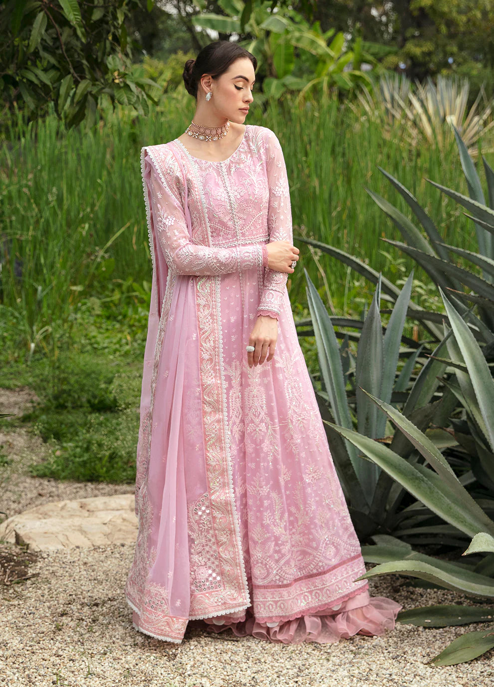 Model wearing Gulaal Amour pink chiffon Eid dress, Suffuse detail, sought - after Pakistani clothes UK.