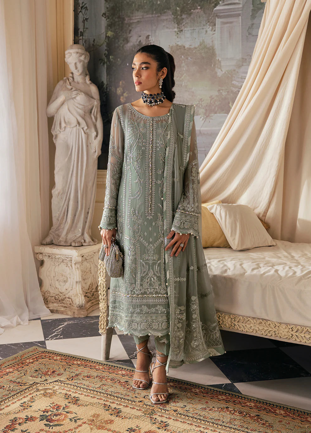 Model in Gulaal UK AMAYAH, sage green embroidered chiffon, '23 V2 Pakistani clothes UK collection.