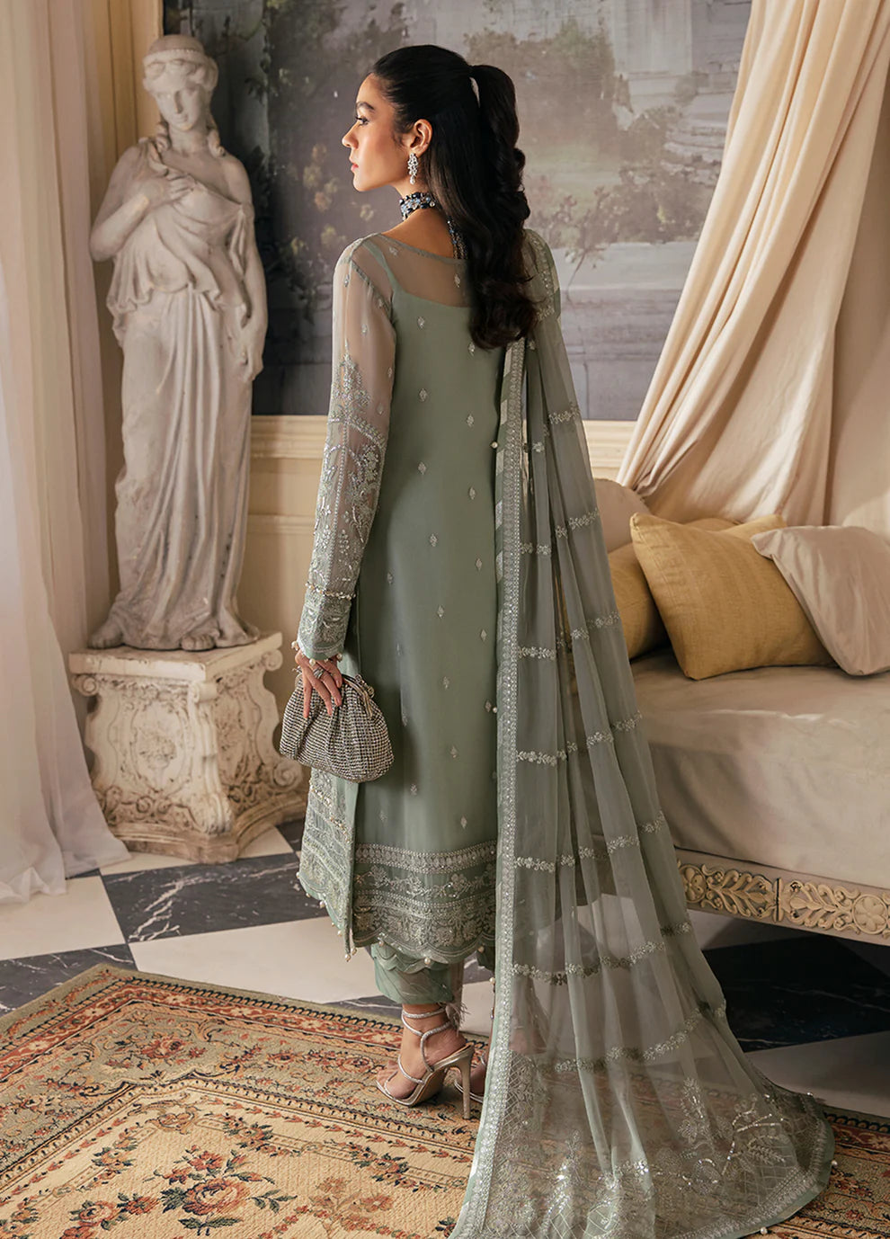 Model in Gulaal UK AMAYAH, sage green embroidered chiffon, '23 V2 Pakistani clothes UK collection.