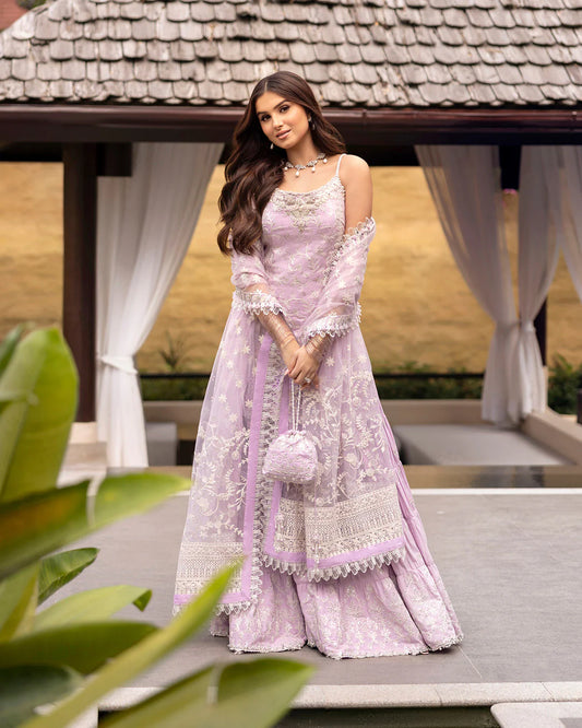 Model wearing lilac Soma dress from Faiza Saqlain Zinnia collection, Pakistani Luxury pret, Faiza Saqlain Pakistani clothes online in UK.