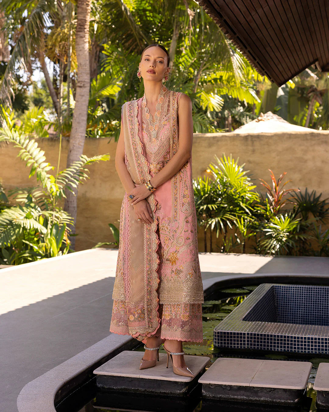 Model wearing peach and gold Peony dress from Faiza Saqlain Zinnia collection, Pakistani Luxury pret, Pakistani clothes online in UK.