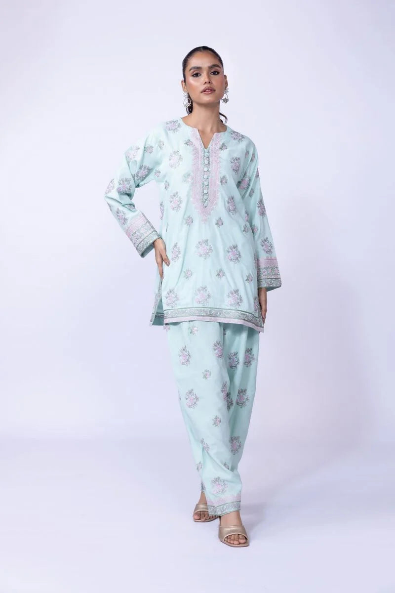 Model wearing Khaadi EST24602B pastel blue dress with delicate floral prints and embroidered details. Shop Pakistani clothes online in the UK now.







