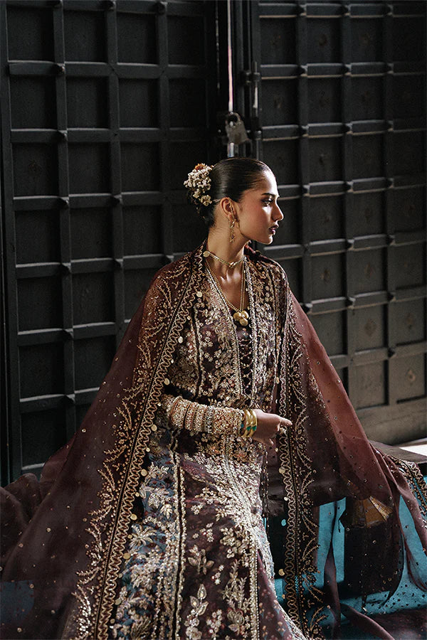 Model wearing dark brown embellished ensemble from Suffuse Vionna, Pakistani luxury pret, shop Pakistani clothes online in UK