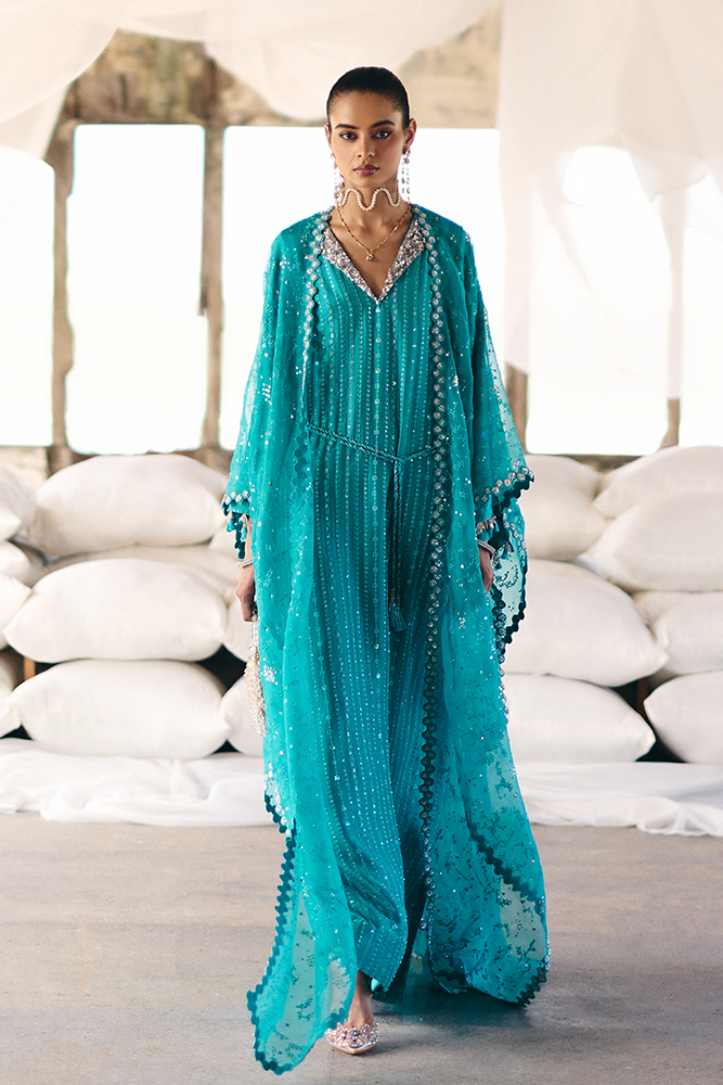 Model wearing NAIDA, front view, a Pakistani designer outfit by Suffuse, available online in the UK.